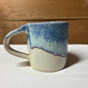 Blue and white studio pottery mug